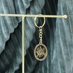 Maa Durga Oval Frame Golden Keychain (1 Pc)