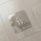 Wall hook holding keys and small accessories